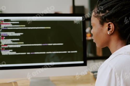 Preview: Woman Looking at Monitor