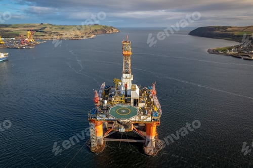 Preview: Oil and Gas Drilling Platform at Sea at Sunset