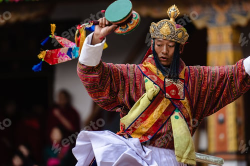 Preview: Bhutanese dancer in traditional dress performs at the Tshechu festival in Punakha.