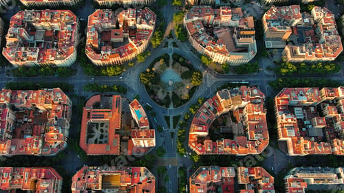 Preview: Aerial view of the residential Eixample district of Barcelona at sunrise. Tetuan Square