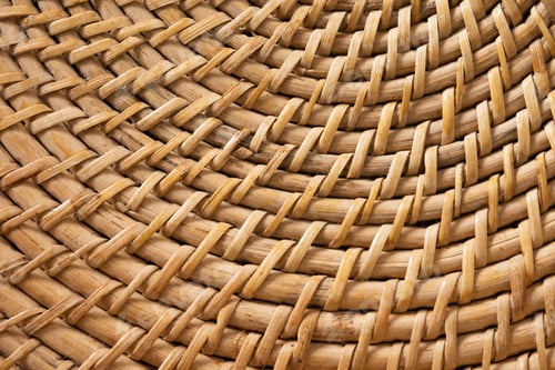 Preview: Part of wicker woven bamboo tray. Abstract pattern of local traditional tableware
