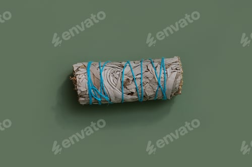Preview: Incense white sage, California dry sage on a green background. Mystical background