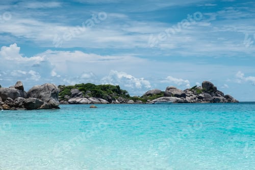Preview: Tropical sea with rocks stack and blue sky