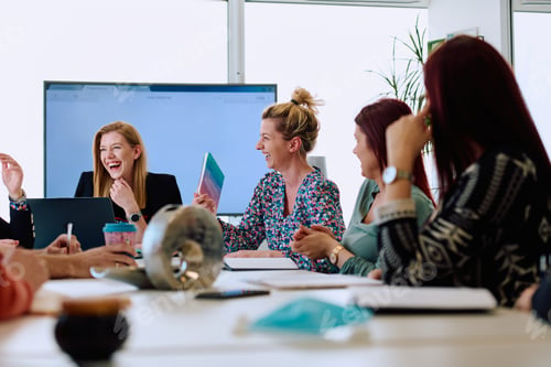 Preview: Diverse Business Team Discussing Projects in a Modern Glass Office.