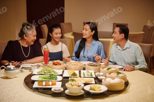 Preview: Family Having Meeting In The Restaurant
