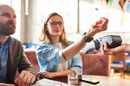 Preview: Paying with smart watch in cafe