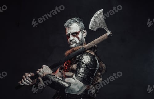 Preview: Serious fantasy barbarian with axe in dark background