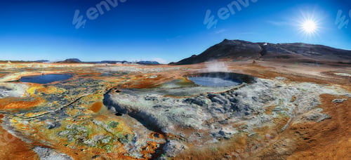 Preview: Boiling mudpots in the geothermal area Hverir and cracked ground around.