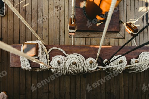 Preview: Ropes to hold the sails of an old sailboat rolled.