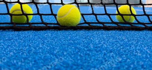 Preview: r sport concept with padel tennis ball on white line on padel tennis court blue color. Flat lay