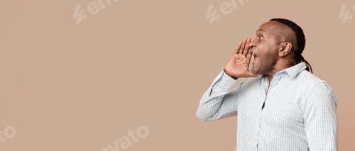 Preview: Mature african man shouting aside at free space