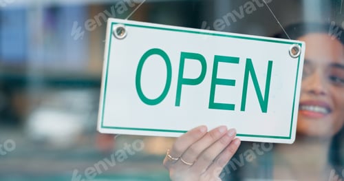 Preview: Happy woman, small business or open sign on window in coffee shop or restaurant ready for service.