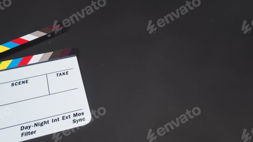 Preview: Clapperboard on black background.