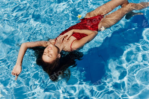 Preview: Woman summer beauty female vacations bikini body water blue pool swim