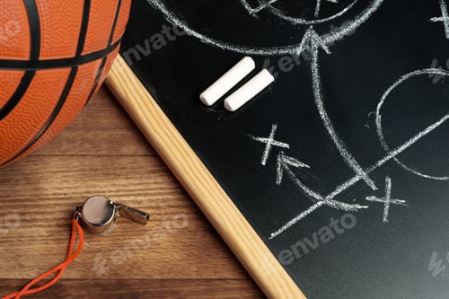 Preview: Basketball ball with chalkboard strategy planning close up