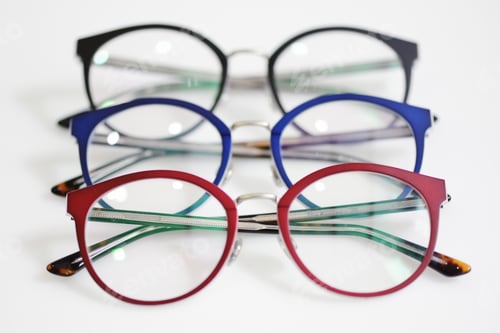 Preview: Multicolored glasses on the white background