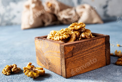 Wooden Bowl Full of Raw Walnut Kernels