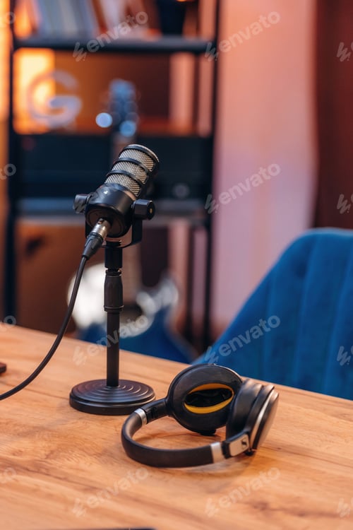 Preview: Microphone and headphones are on the table, room for podcasts