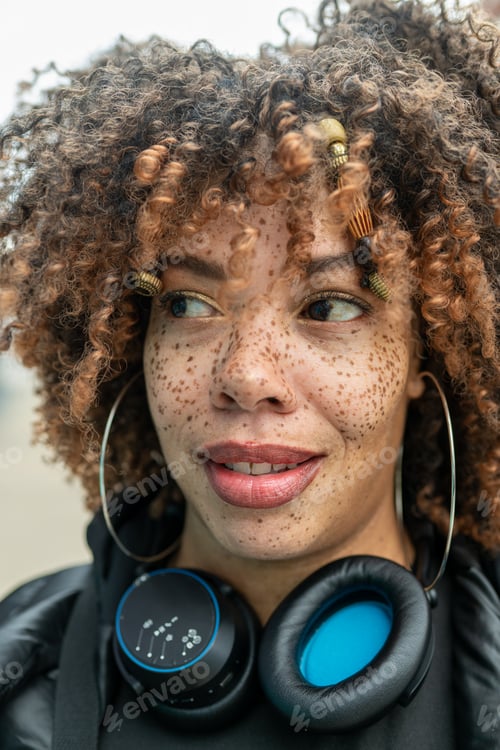 Preview: Close up portrait of woman with headphones