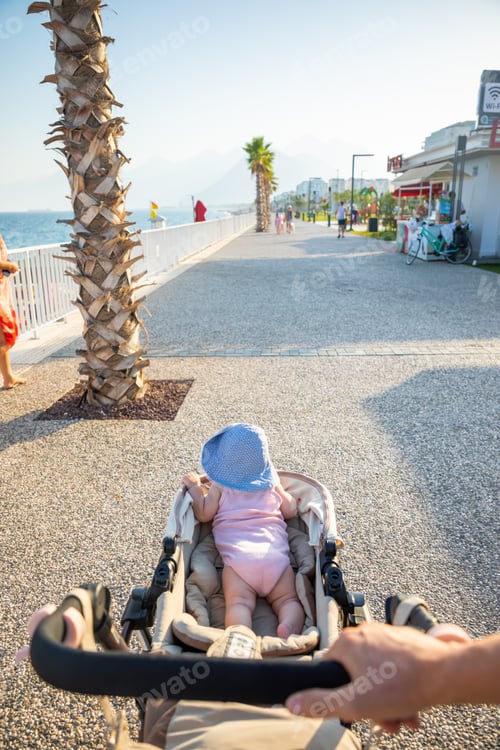 Preview: Walking with baby on Konyaalti sand beach and Taurus mountains in sunset light, Antalya, Turkey