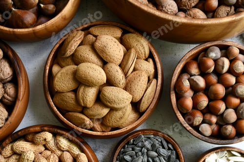 Preview: Nuts and seeds in a wooden bowls