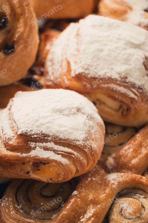 Preview: Vertical closeup shot of delicious freshly baked desserts
