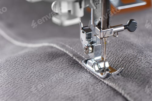 Preview: Modern Sewing Machine With Gray Velours Fabric Close Up