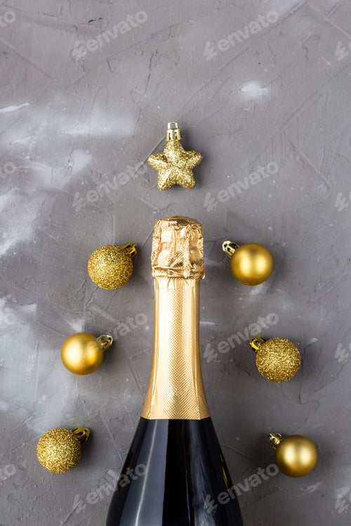 Preview: Christmas background abstract made of champagne bottle and decoration balls and star.