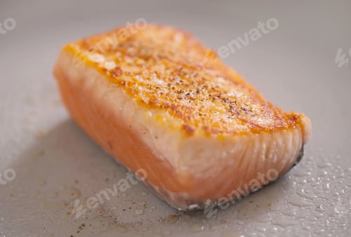 Preview: Roasted salmon fillet on plate. Homemade cooking fresh sliced salmon, serving food for restaurant, m