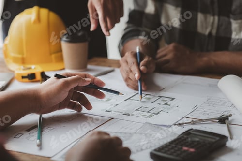 Preview: Architectural Plans Being Discussed in Meeting