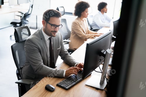 Preview: Startup programmer people group working everyday job at modern office