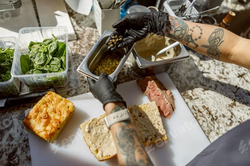 Preview: Crafting a Delicious Sandwich in a Contemporary and Stylish Modern Kitchen Environment