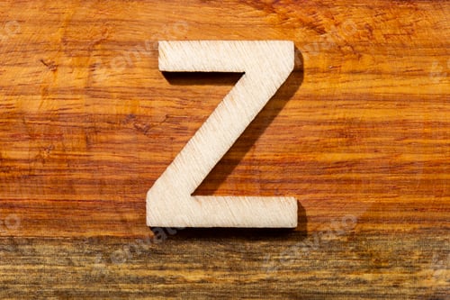 Preview: Wooden letters Z on wooden background, top view