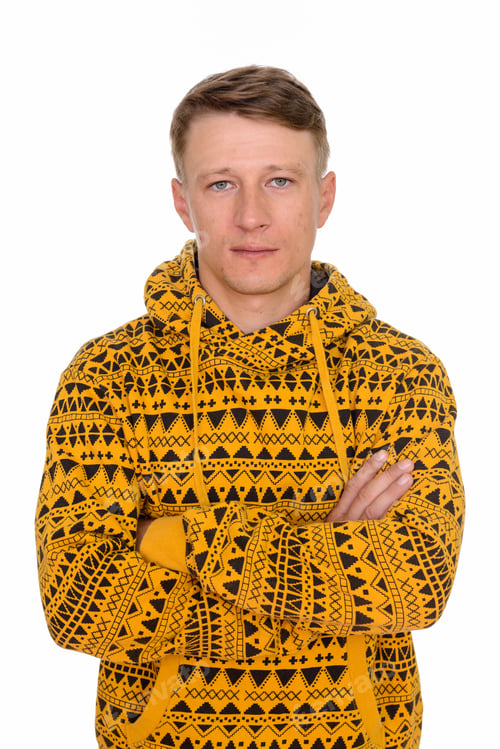 Preview: Studio shot of young handsome Caucasian man isolated against whi