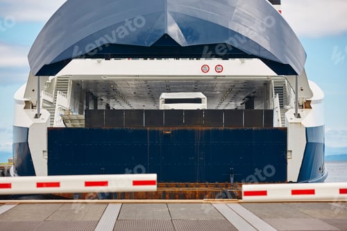 Preview: Norwegian car ferry landing at port. Closed barrier. Horizontal