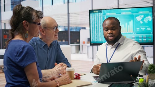 Preview: Senior couple in a detailed consultation with a financial advisor