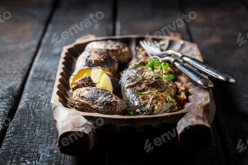 Preview: Homemade trout fish and potatoes with herbs and butter