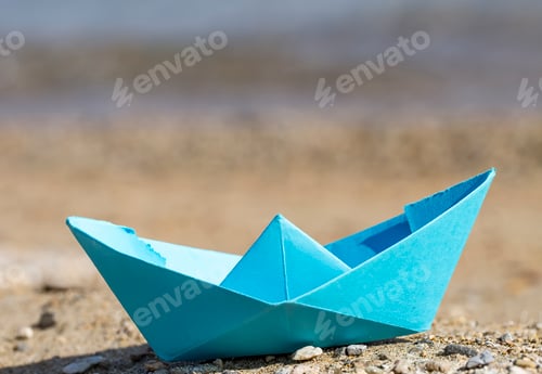 Preview: Paper ship and sea. Travel concept photo.