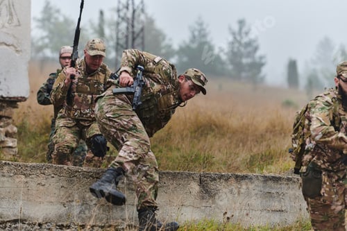 Preview: A highly trained elite military unit, clad in camouflage, skillfully navigates through perilous