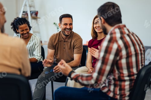 Preview: Group of Happy Friends Sharing Laughter and Conversations in a Relaxed Setting