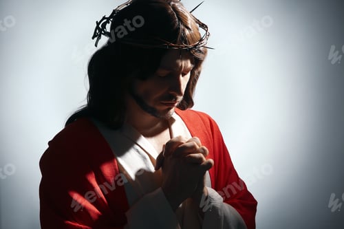 Preview: Jesus Christ with crown of thorns praying on white background