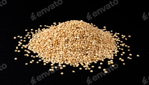 Preview: Heap of quinoa seeds isolated on black background