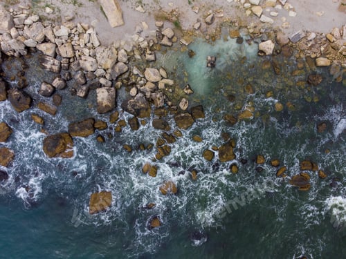 Preview: Aerial view of sea waves and fantastic cliffs, rocky coast.