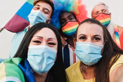 Preview: Multiracial gay friends taking a selfie at LGBT parade