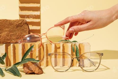 Preview: Glasses in natural textures, stones, wood, on a light background