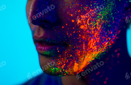 Preview: Fashion model with fluo painting on the face