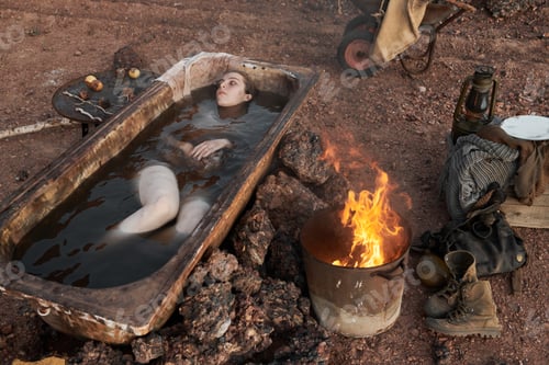 Preview: Depressed woman warming up in the bath