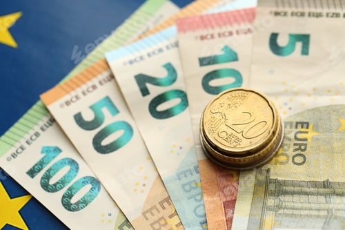 Preview: European union money currency Euro different paper notes and coins on flag