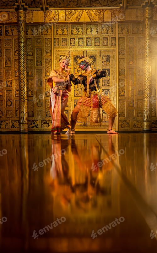 Preview: Vertical image of beautiful Asian woman wear Thai traditional dress action of dancing together