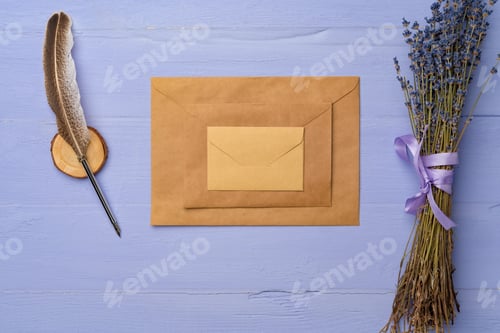 Preview: Letter envelope on lavender wooden background, copy space